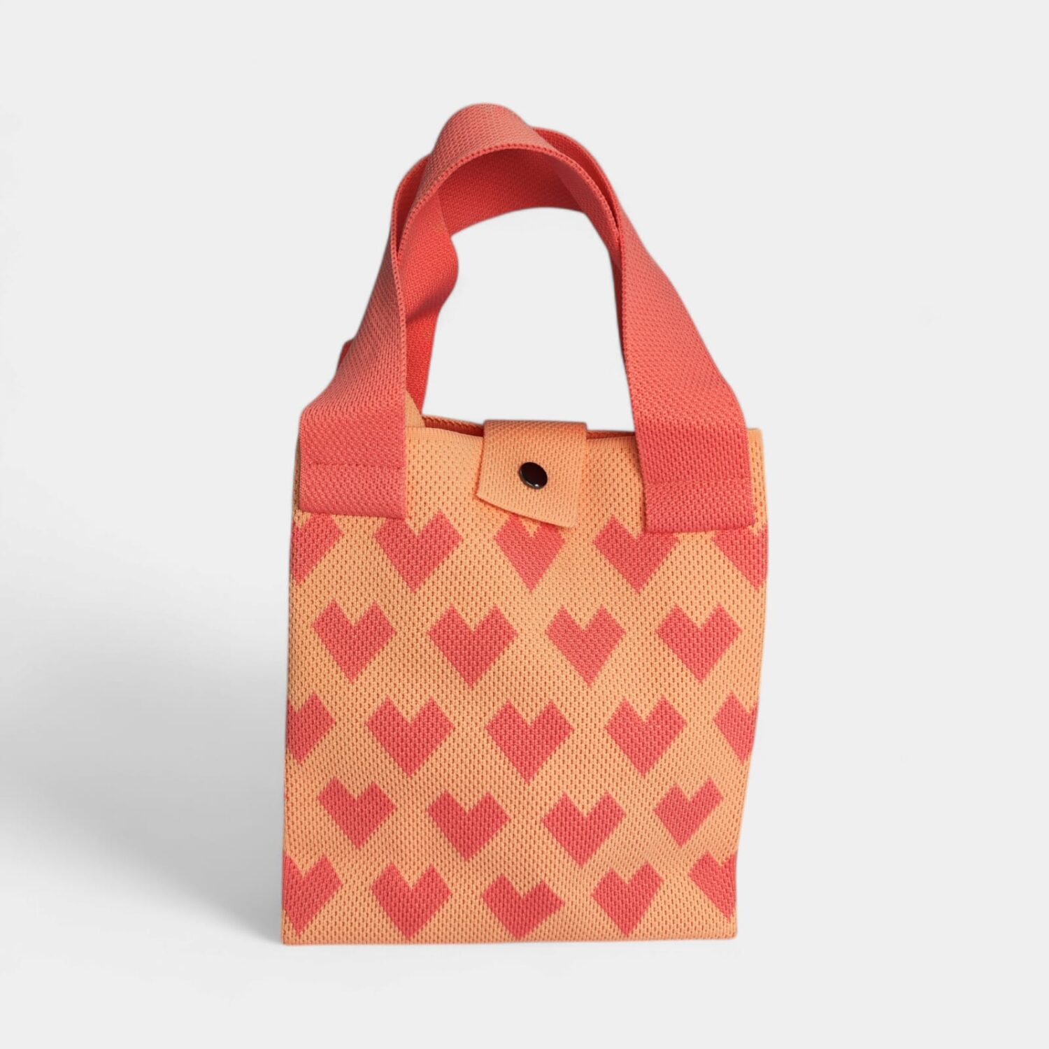 BOLSO MEDIANO DE TELA CON ESTAMPA DE CORAZONES- CITY GIRL